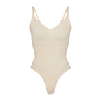 CORRIGERENDE STRING BODYSUIT