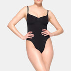 CORRIGERENDE STRING BODYSUIT
